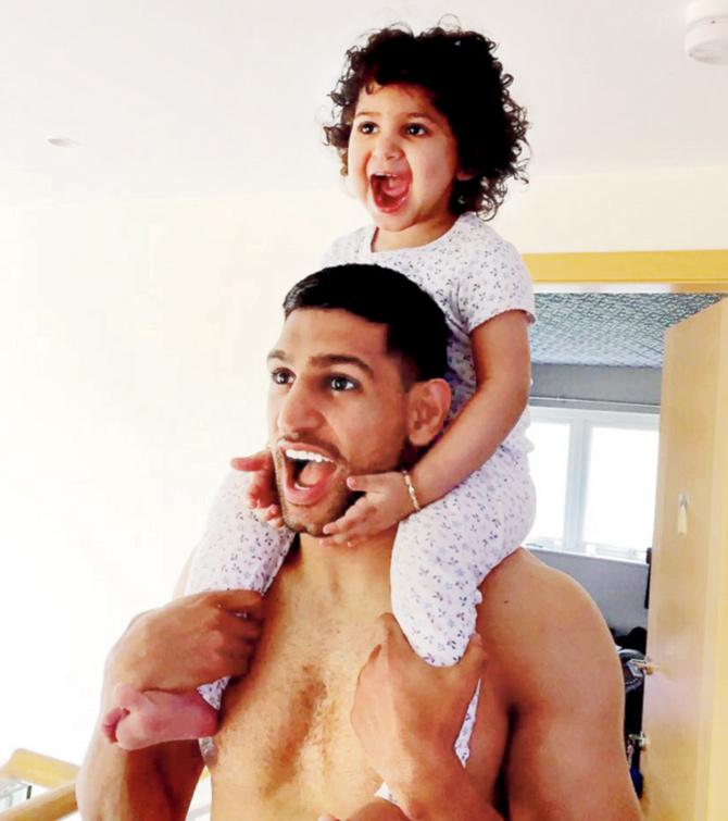 Amir Khan with daughter Lamaisah