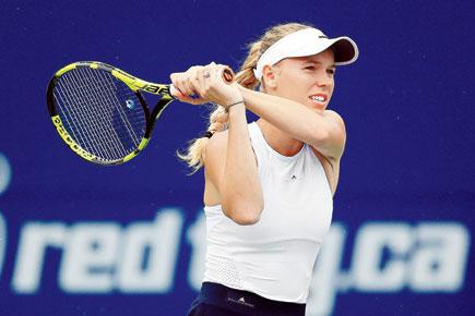 Wozniacki topples top seed Pliskova in QF