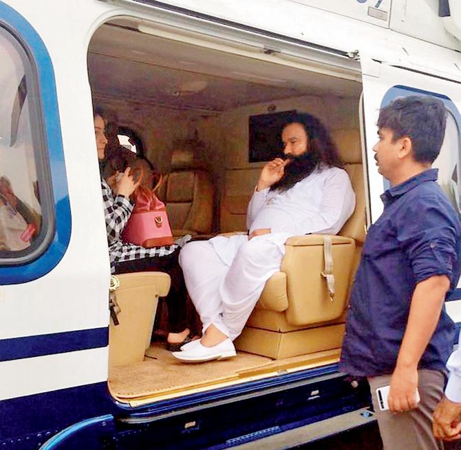 The Dera chief being taken to Rohtak jail on Friday. File pic
