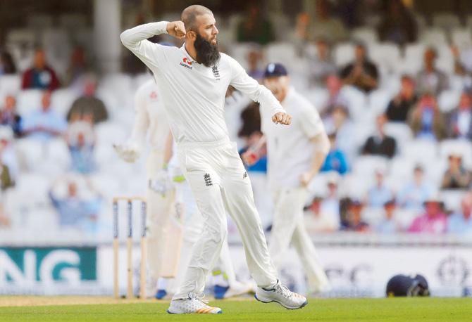 Moeen Ali celebrates the wicket of South Africa’s Dean Elgar on Monday. He went on to become the first player to claim a hat-trick at The Oval. Pic/GETTY IMAGES