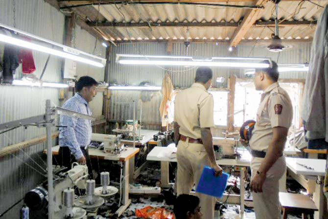 Police raid a workshop in Cheetah Camp using illegal power