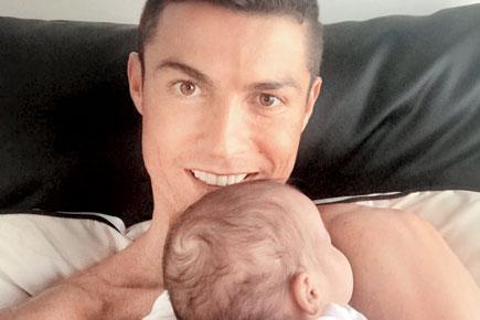 Cristiano Ronaldo looks super cute with his little girl Eva!