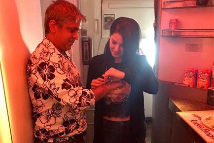 Sunny Leone ties rakhi to her bodyguard mid-air! See photo