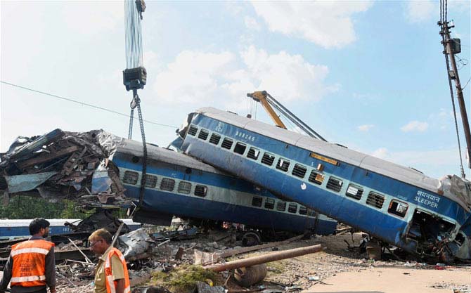 A mangled coach of the Puri-Haridwar Utkal Express train at the accident site in Khatauli near Muzaffarnagar on Sunday. Pic/PTI
