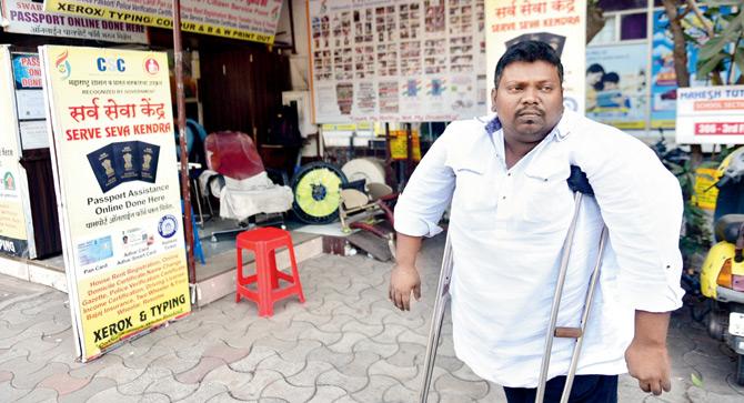 Prakash Nadar, 41, ran an Aadhaar registration centre at Worli, enabled with a ramp for the disabled. It opened in June 2016 but was shut down a few months ago. He says he is yet to receive the R25 per registration promised by the government. Pic/Bipin Kokate