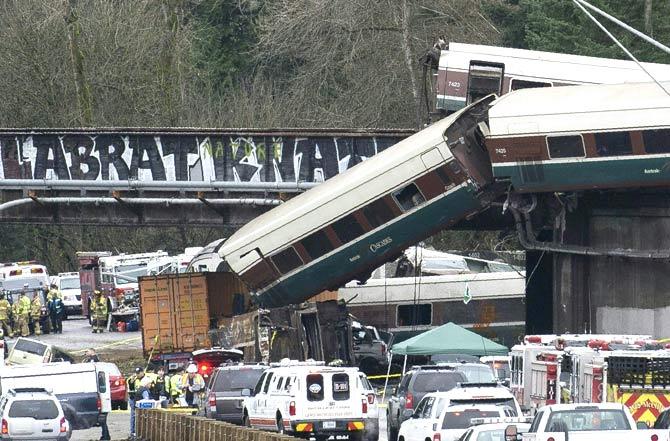 The scene of a portion of the Interstate I-5 highway after an Amtrak high speed train derailled from an overpass near the city of Tacoma, Washington. Pic/AFP