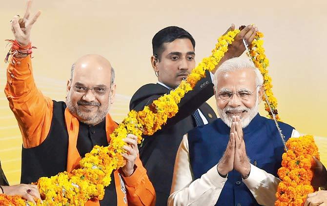 Prime Minister Narendra Modi and BJP President Amit Shah at a felicitation function in New Delhi after the party’s win in Gujarat and Himachal Pradesh Assembly elections. Pic/PTI