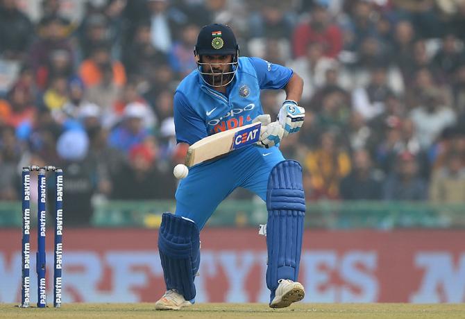 Indian cricket team captain Rohit Sharma plays a shot during the second One Day International (ODI) cricket match between India and Sri Lanka at The Punjab Cricket Association Stadium in Mohali on December 13, 2017. Pic/ AFP