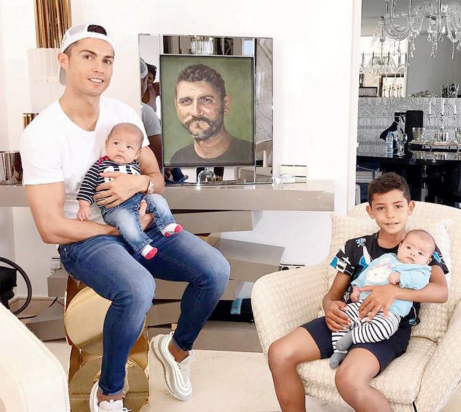 Cristiano Ronaldo with his kids Cristiano Jr and twin babies Eva and Mateo. Pic/Cristiano’s Instagram Account