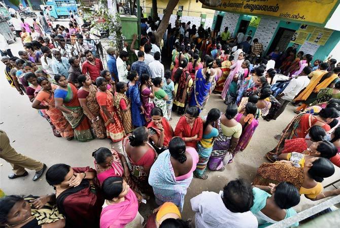 People wait in long queues to cast their votes for the Dr Radhakrishnan Nagar Assembly constituency bypoll in Chennai on Thursday. Pic/AFP