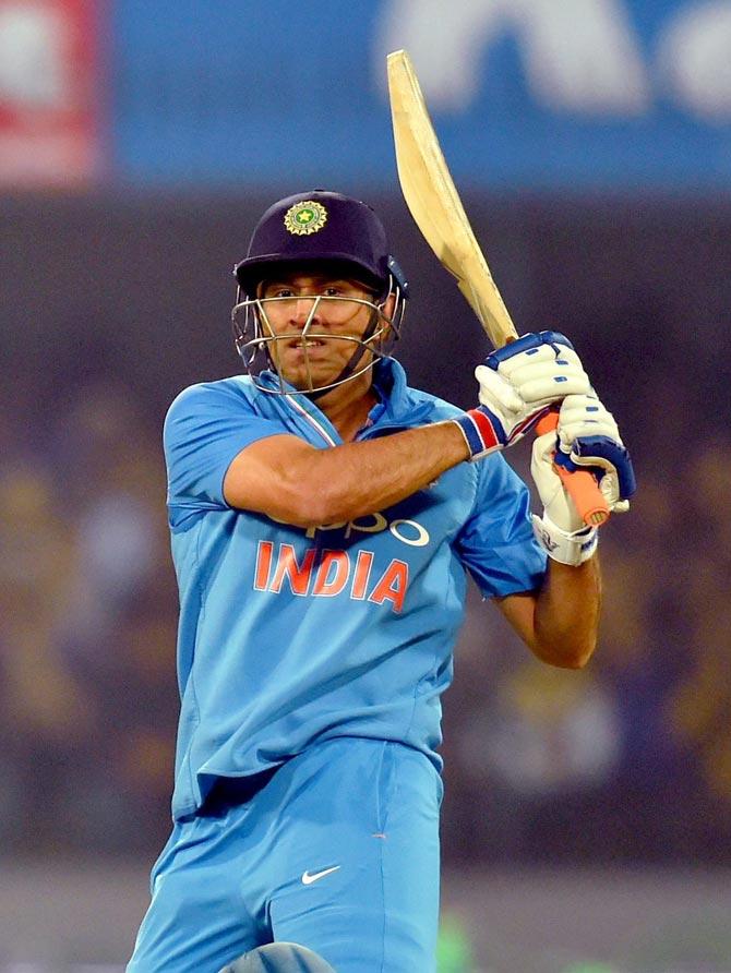 Indian batsman M S Dhoni plays a shot during the 2nd T-20 cricket match against Sri Lanka, in Indore on Friday. Pic/PTI