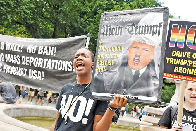 Trumps travel ban was challenged by Hawaii and American Civil Liberties Union in separate lawsuits. It also attracted widespread protests, like this one in New York city. Representation pic/afp
