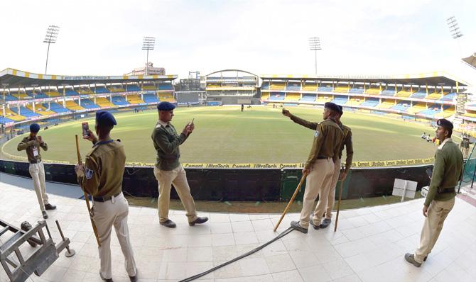 Policemen, guarding at Holkar Stadium, take selfie, on the eve of 2nd T-20 match between India and Sri Lanka in Indore on Thursday. Pic/PTI