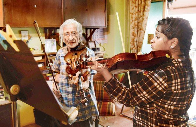 Jini Dinshaw, founder trustee of the citys longest running ensemble, the Bombay Chamber Orchestra, with a pupil at Venkatesh Chambers where she has taught music for 55 years. PIC/SURESH KARKERA