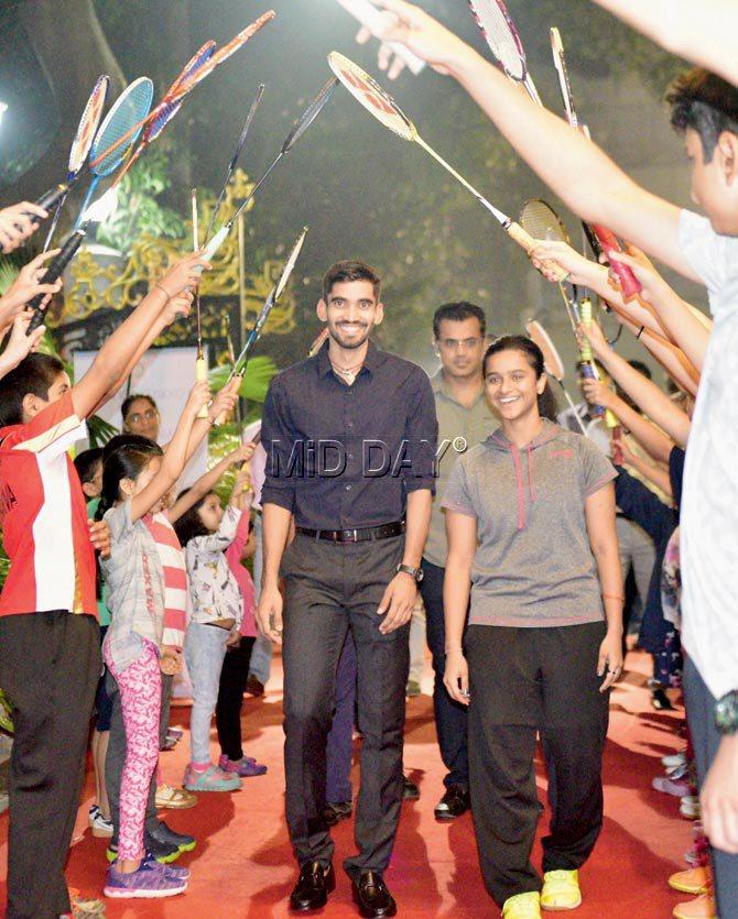 Kidambi Srikanth gets a rousing welcome by budding shutters at Cricket Club of India on Saturday. Pic/Bipin Kokate