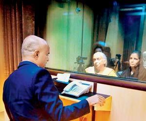 Kulbhushan Jadhav 'meets' wife, mother through a glass screen