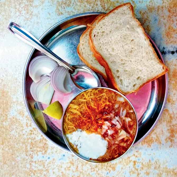  Amol Gurav adds dahi to the misal served at his Kolhapur eatery