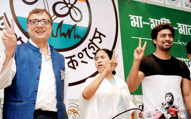 Derek O Brien (left) with Mamata Banerjee at a press conference after her victory in the assembly elections, in Kolkata, 2016. PIC/GETTY IMAGES  
