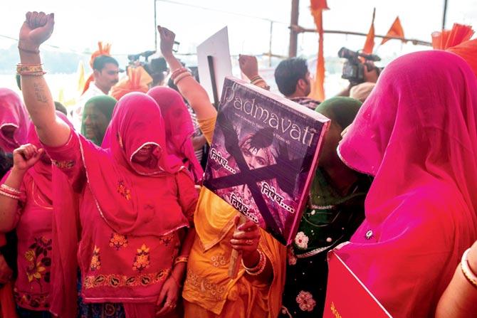 Deepika Padukone promotes the film; Akhil Bhartiya Maratha Mahasangha protest against Padmavati at Azad Maidan on November 20. PICS/GETTY IMAGES 