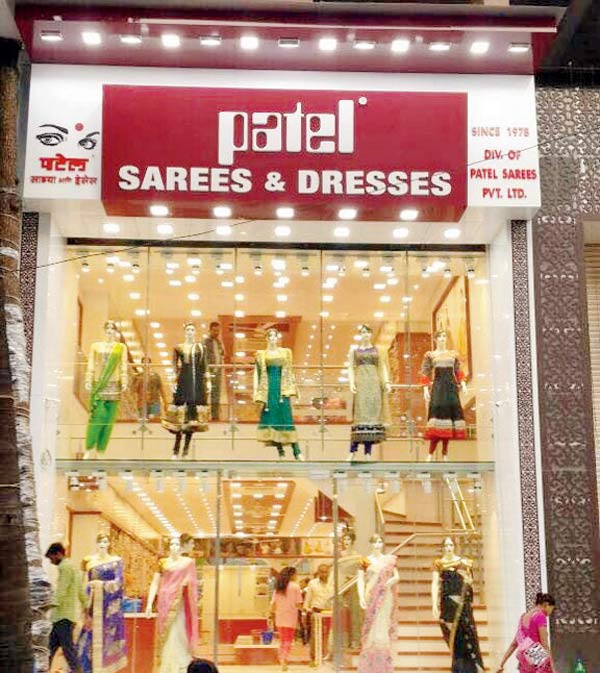 A garments storeroom in Thane with the name displayed according to law