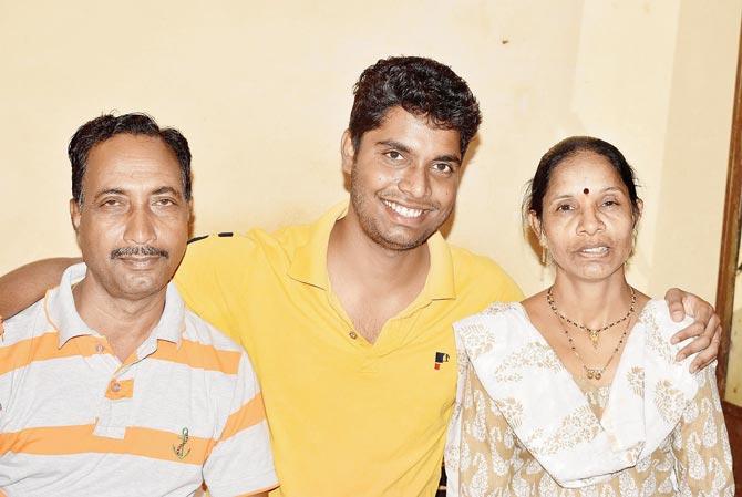 With his father Soma and mother Indu.