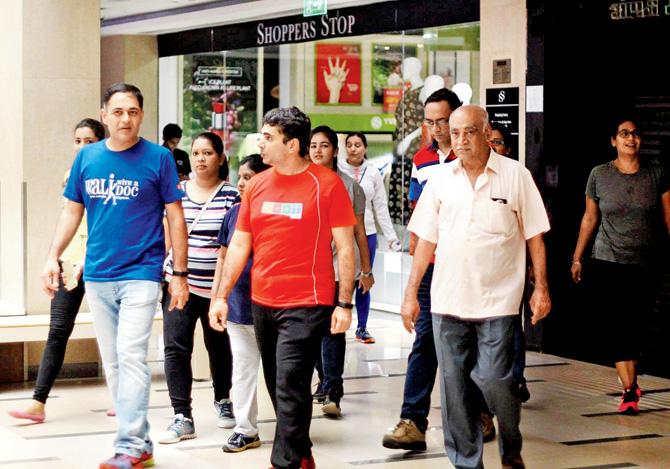 Dr Amit Thadani and GOQii founder Vishal Gondal (centre) kick off a walk at Inorbit Mall, Vashi, on July 30. Dr Thadani decided on a mall walk because it was raining that day and he didn’t wish to cancel