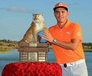 Flaming orange Fowler sizzles with 61 as Woods pleased with return to golf