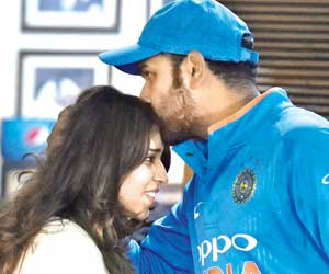 Rohit kisses emotional wife Ritika after double ton on wedding anniversary
