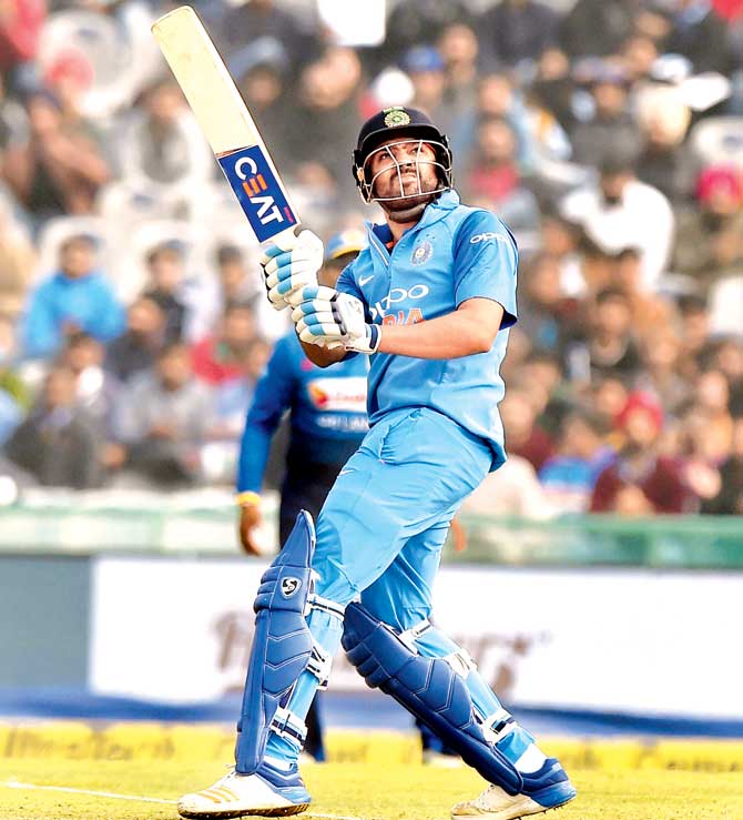 India captain Rohit Sharma takes the aerial route against Sri Lanka in Mohali where he slammed his third ODI double century yesterday. Pic/PTI