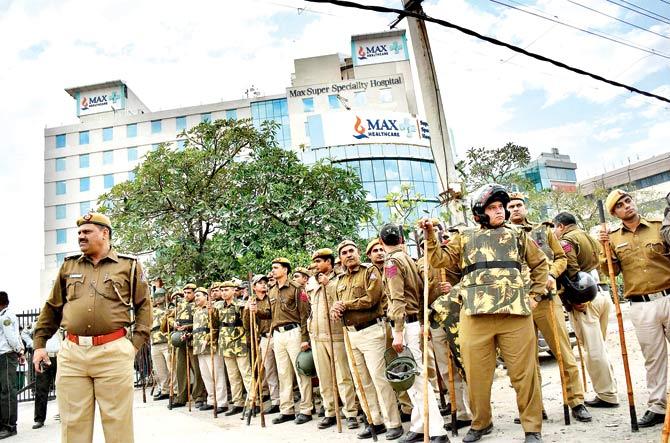 Security outside the Max Hospital, Shalimar Bagh. Pic/PTI