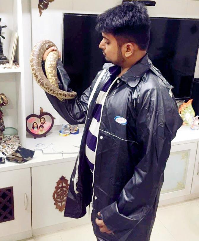 Sitaram Chavan managed to catch the snake, which the forest department released in the forest