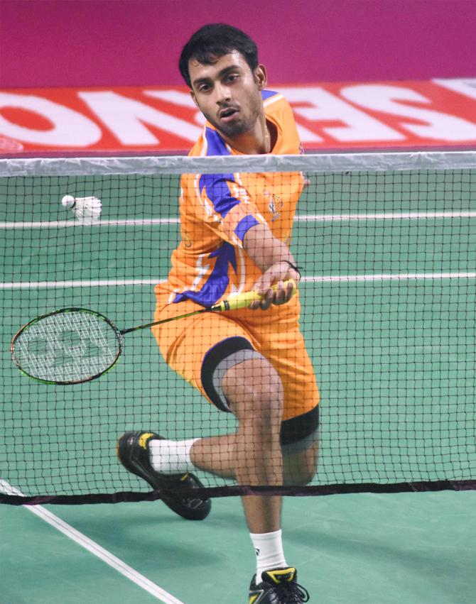 Ahmedabad Smash Masters Sourabh Verma returns a shot during his singles match at the third edition of Premier Badminton League 2017-18 in Guwahati on Tuesday. Pic/PTI