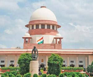 Slain Gujarat RTI activist's father moves SC against violation of its order