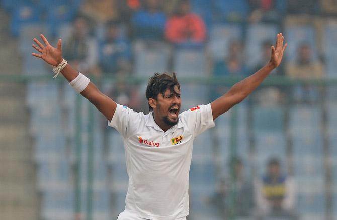 Sri Lanka bowler Suranga Lakmal celebrates after he dismissed Indian batsman Murali Vijay during the fourth day of third Test cricket match between India and Sri Lankr at the Feroz Shah Kotla Cricket Stadium in New Delhi on December 5, 2017. Pic/ AFP