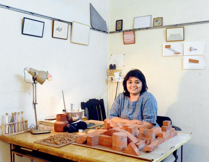 Visual artist Teja Gavankar at her Borivli workspace Studioon, where she is currently repurposing bricks. Like in her earlier works, here too she is seeking newer spaces, crevices and corners within conventional brick-bound structures. PIC/FALGUNI AGRAWAL 