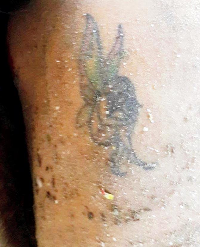 Cops are relying on the Tinker Bell tattoo on the body to identify her
