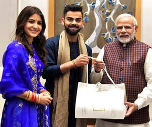 Newlyweds Virat Kohli and Anushka Sharma meet PM Narendra Modi