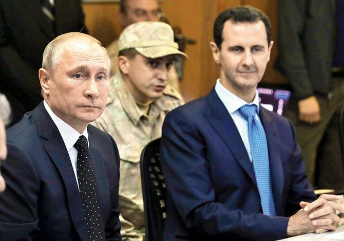 Vladimir Putin and Bashar al-Assad. Pic/AFP