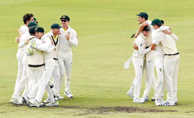 All 11 Australians are captured in one frame after Pat Cummins claimed the final wicket of England