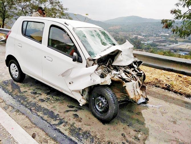 The Maruti Alto that was crushed in a collision near Borghat yesterday