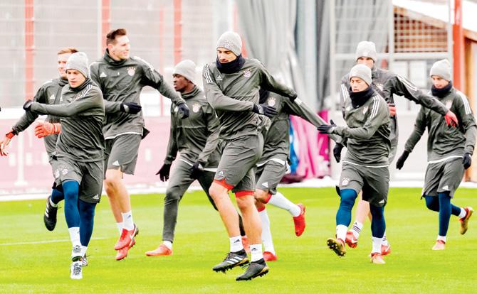 Bayern Munich players during a training session yesterday, ahead of their UEFAâu00c2u0080u00c2u0088Champions League match against PSG in Munich tonight. Pic/AFP