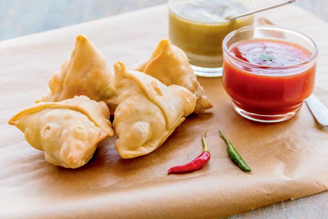 Popular Indian snack samosa with Kashmiri chilli chicken fillings has beaten chocolate, cashew nuts and other exotic entries in a first such contest in South Africa