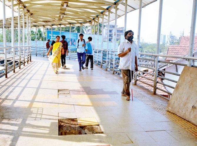 Tiles broken or missing, benches damaged, and beggars and anti-social elements are just some of the problems of the Santacruz skywalks in the east and west. Pics/Falguni Agrawal