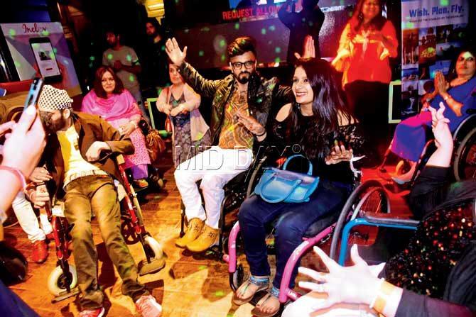 Many wheelchair-bound people were seen hitting the dance floor at Kitty Su in Andheri last night. Pics/ Atul Kamble