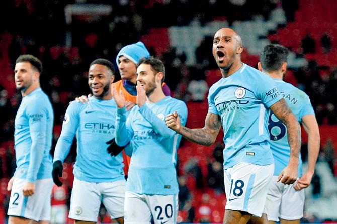 Jubilant Man City players celebrate their win over Man United in an EPLâu00c2u0080u00c2u0088clash on Sunday. pic/afp 