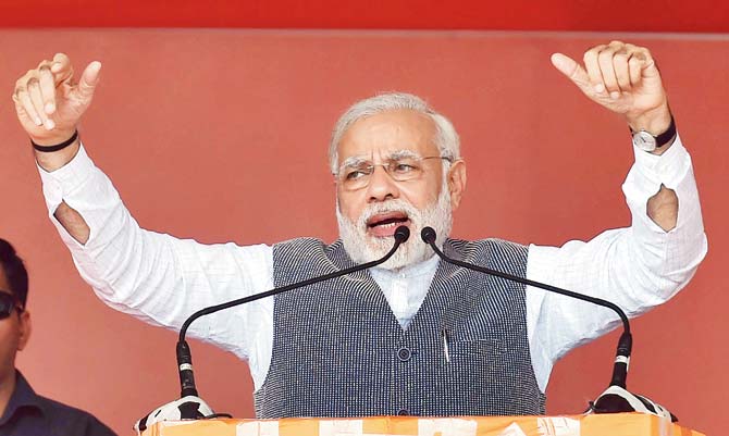 Narendra Modi also raised questions over the alleged appeal by former director general of the Pakistan Army, Sardar Arshad Rafiq, that senior Congress leader Ahmed Patel be made CM of Gujarat. Pic /PTI