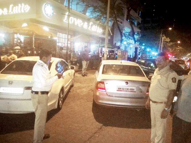 Haphazard parking outside Love and Latte in Lokhandwala