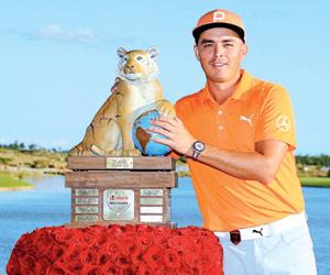 Golf: Rickie Fowler clinches title, Tiger Woods happy with return