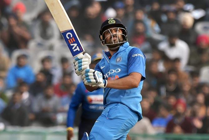 Rohit Sharma plays a shot during the second ODI cricket match against Sri Lanka in Mohali. Pic/ PTI