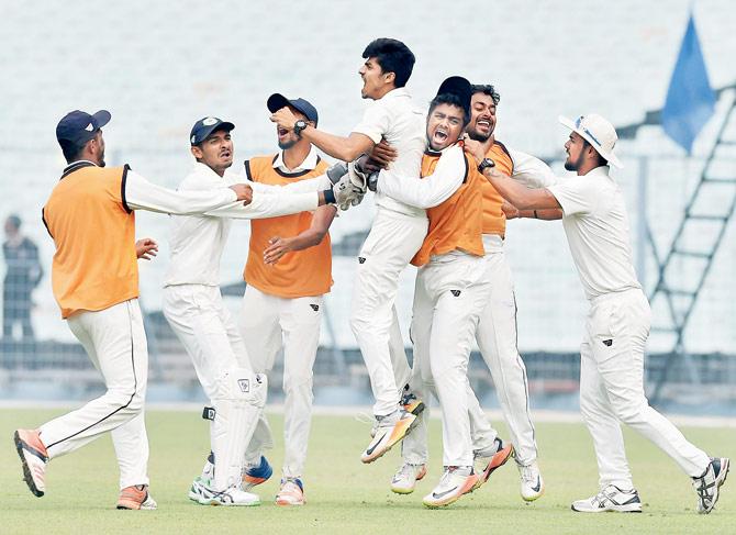 Vidarbha players are ecstatic after their win over Karnataka in the Ranji Trophy semi-final. Pic/PTI